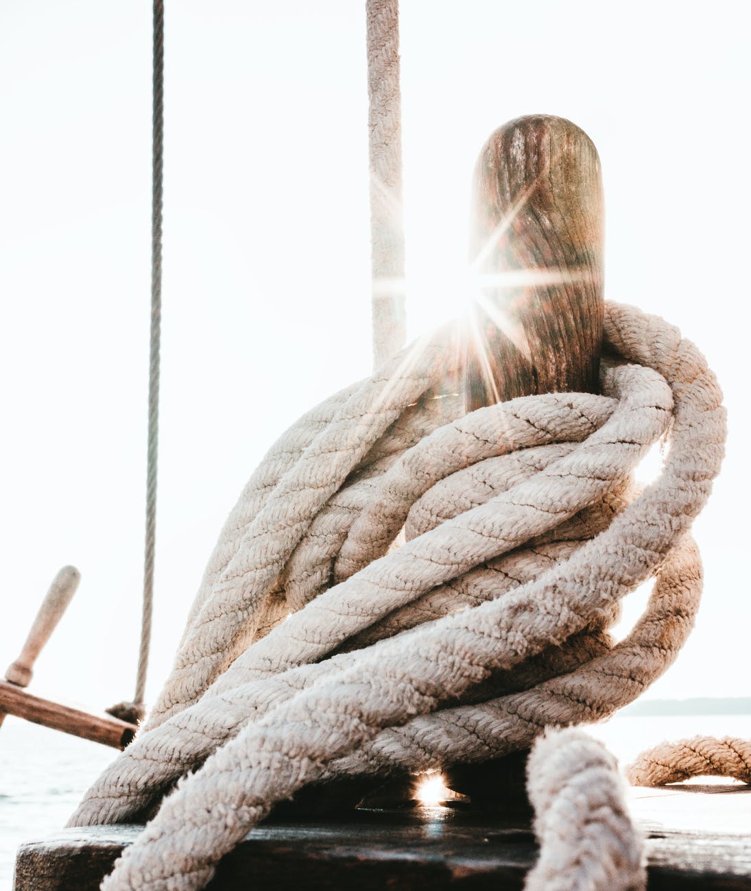 brown wooden stick surrounded by rope